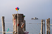  Detail of utensils on wooden pole, in the background the fishermen&#39;s huts on stilts, Venice Lagoon, Veneto, Italy, Europe 