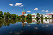  Cathedral church reflected in the Muehlenteich, Hanseatic City of Luebeck, Schleswig-Holstein, Germany 