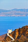 View of Chora village and Sifnos island in the distance, Chora, Serifos Island, Cyclades Islands, Greece\n