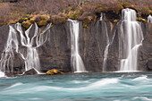  Hraunfossar are waterfalls of the river Hvíta, Winter, Vesturland, Iceland 