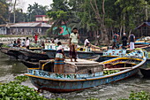  Traders sell watermelons and other fruits from boats at the Boithakata floating market on the Belua River, Boithakata, Pirojpur District, Bangladesh, Asia 