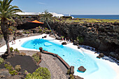 Tropical garden and Jameo Grande swimming pool Jameos de Aqua designed by Cesar Manrique, Lanzarote, Canary Islands, Spain
