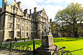 Graduates Memorial building and George Salmon statue, Trinity College university, city of Dublin, Ireland, Irish Republic