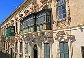 Traditional balconies of historic buildings in city centre, Valletta, Malta