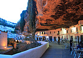 Cafes under rock cave overhang, Setenil de las Bodegas, Cadiz province, Spain