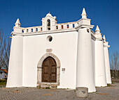 Late Gothic architectural style whitewashed hermitage chapel of Saint Sebastian, 'Ermida de Sao Sebastiao' in village of Alvito, Baixo Alentejo, Portugal, southern Europe