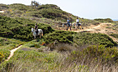 Three people pony trekking on coastal path, the Fisherman's Trail of Ruta Vicentina, Odeceixe, Algarve, Portugal, Southern Europe