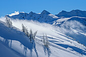  Winter mood at Wiedersberger Horn with view to Standkopf, Wiedersberger Horn, Kitzbühel Alps, Tyrol, Austria 