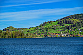  View over the Schliersee to the town of Schliersee, on the Lake Constance-Königssee cycle path, Upper Bavaria, Bavaria, Germany 