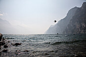  Lake Garda, stormy sea, waves; rugged rocks 