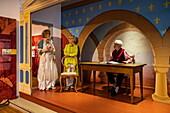  Costumed tour guides explain exhibits in the Brothers Grimm House Museum, Steinau an der Straße, Spessart-Mainland, Hesse, Germany 