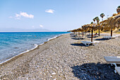  Pebble beach Agios Fokas Beach with view of Cape Fokas on the island of Kos in Greece 