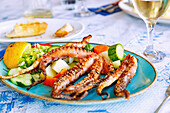  grilled octopus with vegetables on the island of Kos in Greece 