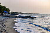  Sandy beach in Tigaki (Tingaki) just before sunset on the island of Kos in Greece with a view of the coast of Turkey 