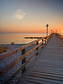  Sunset at the pier in Wustrow, Wustrow, Baltic Sea, Fischland, Darß, Zingst, Vorpommern-Rügen district, Mecklenburg-Vorpommern, Western Pomerania region, Germany, Europe 