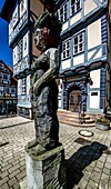  Holleum in the Old Town Hall, statue of Frau Holle on the market square in Hessisch Lchtenau, Hesse, Germany 