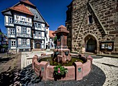  Chancellor Feige fountain, portal of the parish church, Holleum in the old town hall, market square of Hessisch Lichtenau, Hesse, Germany 