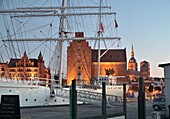  View with Gorch Fock from the harbor to St. Nicholas Church, Stralsund, Mecklenburg-Western Pomerania, Germany 