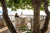 Terrace facing the sea, shaded by fig trees, Liro Hotel, Vlore, seaside resort on the Adriatic Sea, Albania, Southeastern Europe