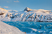  Ice formations at the Svinafellsjoekull glacier tongue, Vatnajoekull National Park, winter, Iceland 