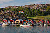  Red boathouses in Hamburgsund, Bohuslaen, Sweden 