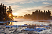  Cold fog over the river Dalaelven in winter, Gaestrikland, Sweden 