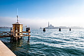  View in the fog of the Giudecca, Venice, Veneto, Italy 