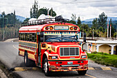 bus jumping a baden, Chichicastenango,  El Quiche, Guatemala, Central America