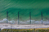  Groynes serve as coastal protection near Wustrow, Fischland, Mecklenburg-Vorpommern, Germany 