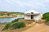 shelter house on the edge of the Cami de Cavalls (hiking trail GR 223) beside the Cala Rambles, s'Albufera des Grau Natural Park, Menorca, Balearic Islands, Spain, Europe