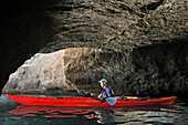 kayak tour inside a natural cave S'Olleta de Trebaluger near Cala Galdana, South Coast of Cala Galdana, Menorca, Balearic Islands, Spain, Europe