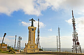 statue of Christ and telecommunications towers at the top of Monte Toro, the tallest hill of Menorca, Balearic Islands, Spain, Europe