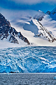 Deep Blue Glacier and Snowcapped Mountains, Albert I Land, Arctic, Spitsbergen, Svalbard, Norway, Europe