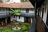 patio of an colonial-era building housing the famous restaurant La Sociedad in Calle11 #6-42, La Candelaria district  Bogota, Colombia, South America