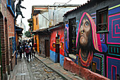 portrait of a Wayuu indigenous woman by Colombian street artist and muralist Carlos Trilleras, mural painting in Calle del Embudo (street of funnel), La Candelaria district, Bogota, Colombia, South America