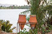 Jars filled with water made available for every one working in the fields, bank of the Nile near Esna, Egypt, Northeasthern Africa