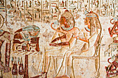 Painted engravings of the tomb of Setau, showing him with his wife smelling a lotus flower. El Kab necropolis on the east bank of the Nile, Egypt, Northeast Africa