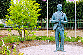  Bronze sculpture by Marcel Proust in the garden at the Villa du Temps retrouvé (retrouve) museum in Cabourg on the Flower Coast (Côte Fleurie, Cote Fleurie) in the Calvados department in the Normandy region of France 