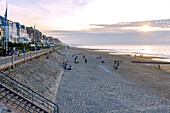  Beach promenade (Promenade Marcel Proust) and beach at sunset in the evening light in Cabourg on the Flower Coast (Côte Fleurie, Cote Fleurie) in the Calvados department in the Normandy region of France 