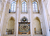  Historic clock with tide display in the church Abbatiale de la Sainte-Trinité (Ste-Trinite) in Fécamp (Fecamp) on the Alabaster Coast, (Côte d&#39;Albatre, Cote d&#39;Albatre) in Normandy in France 