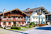  Market square with historic house Schusterhäusl with Lüftlmalerei in Törwang am Samerberg in Chiemgau in Upper Bavaria in Germany 