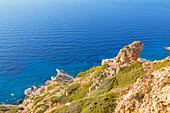 View of Folegandros Island multicolored rocks coastline, Chora, Folegandros Island, Cyclades Islands, Greece