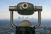   viewing machine at Griffith Observatory looking towards Downton Los Angeles California focus back 