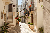 Charming narrow streets of Locorotondo, Puglia, Italy.