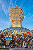 Exterior view of the Hotel Grand Lisboa with its iconic shiny golden dome. Macau, China.