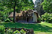 thatched granary in the village of Kurzeme,Ethnographic Open-Air Museum around Riga,Latvia,Baltic region,Northern Europe