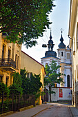 Mykolo street with in the background the Church Heritage Museum located inside the 17th-century former St. Michael's Church, Vilnius, Lithuania, Europe