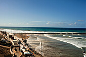  Surfer beach of Rabat at high tide at midday with high waves in Rabat, Morocco. 