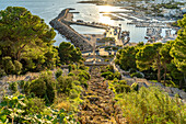  View of the Roman column Colonna Romana, Scalinate Monumentale and the Marina Porto Turistico in Santa Maria di Leuca, Apulia, Italy, Europe 