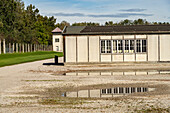  Roll call area, barracks and watchtower of the Dachau concentration camp memorial, Bavaria, Germany  